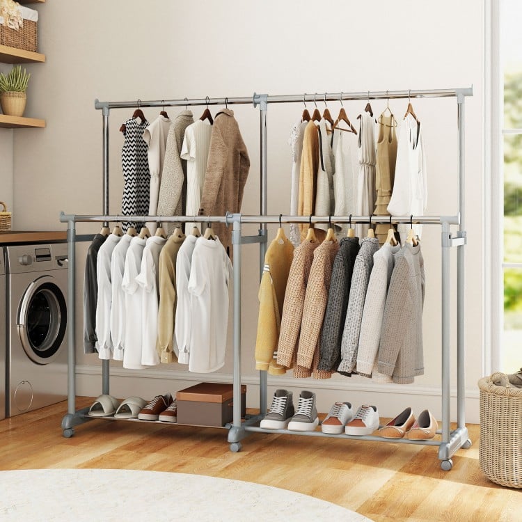 Double rod clothes rack with adjustable height and extendable width, featuring sturdy metal construction and.