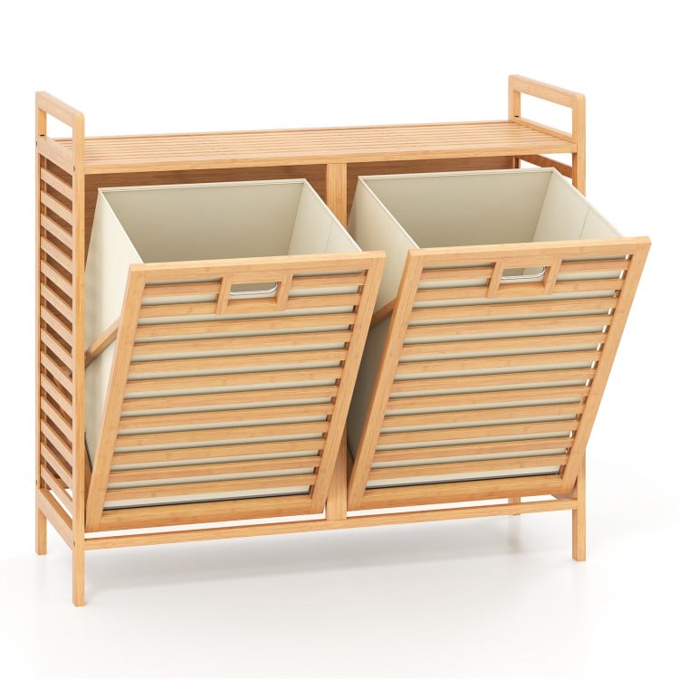 Double tilt-out laundry hamper in natural bamboo with two removable bins and top storage shelf for easy organization.