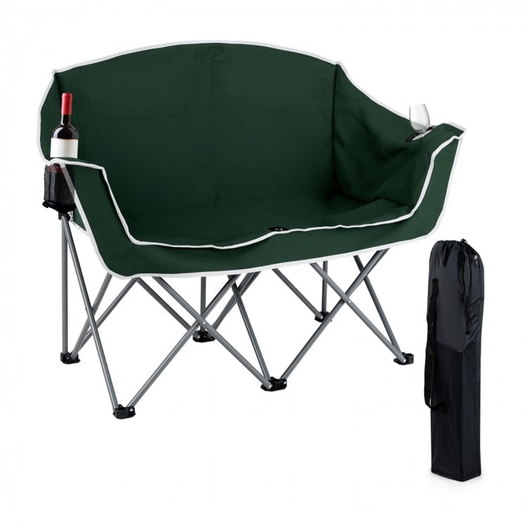 Portable oversized loveseat camping chair in green with armrests and cup holders, perfect for outdoor relaxation.