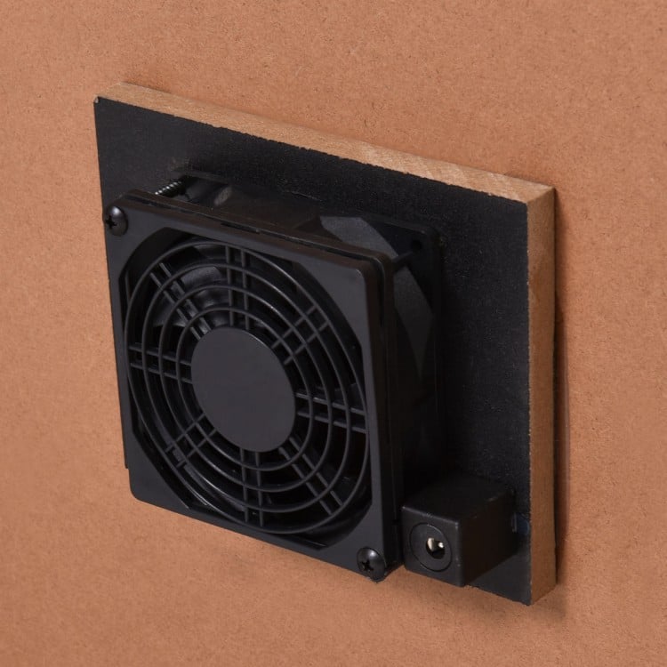 Close-up of the air hockey table's 12 V DC motor fan, providing steady airflow for realistic gameplay.
