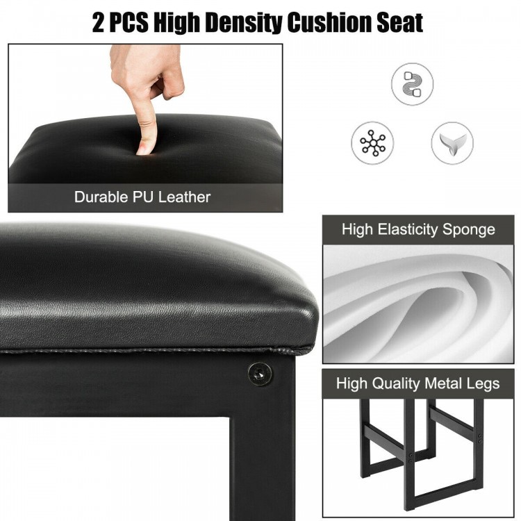 Close-up of a high-density PU leather cushion seat for a 3 pcs dining set with black stools and marble top table.