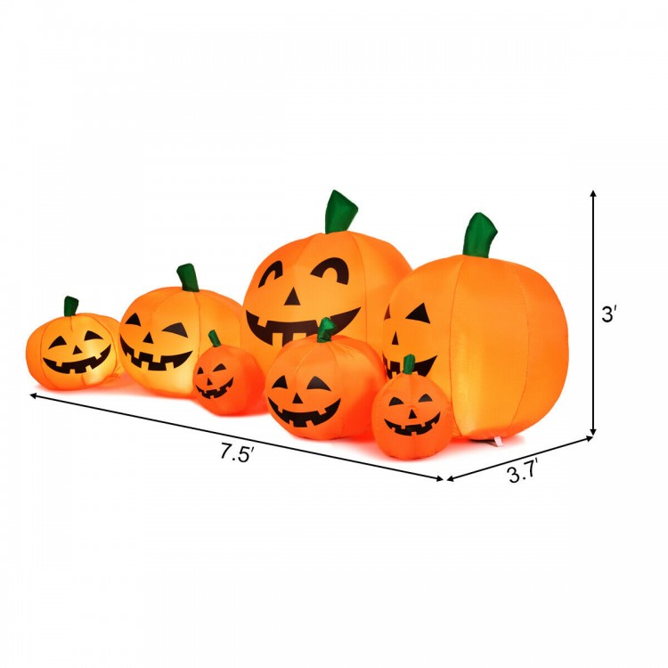 Inflatable Halloween pumpkin patch featuring 7 cheerful pumpkins, 7.5 feet long, with LED lights for festive outdoor.