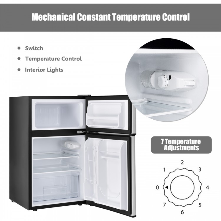 Compact stainless steel refrigerator with adjustable thermostat, featuring interior lights and multiple storage options.
