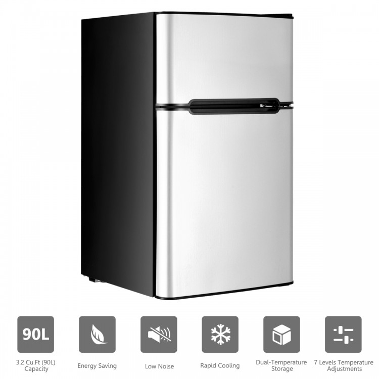 Compact stainless steel refrigerator featuring a flat-back design, ideal for conserving space in small areas.