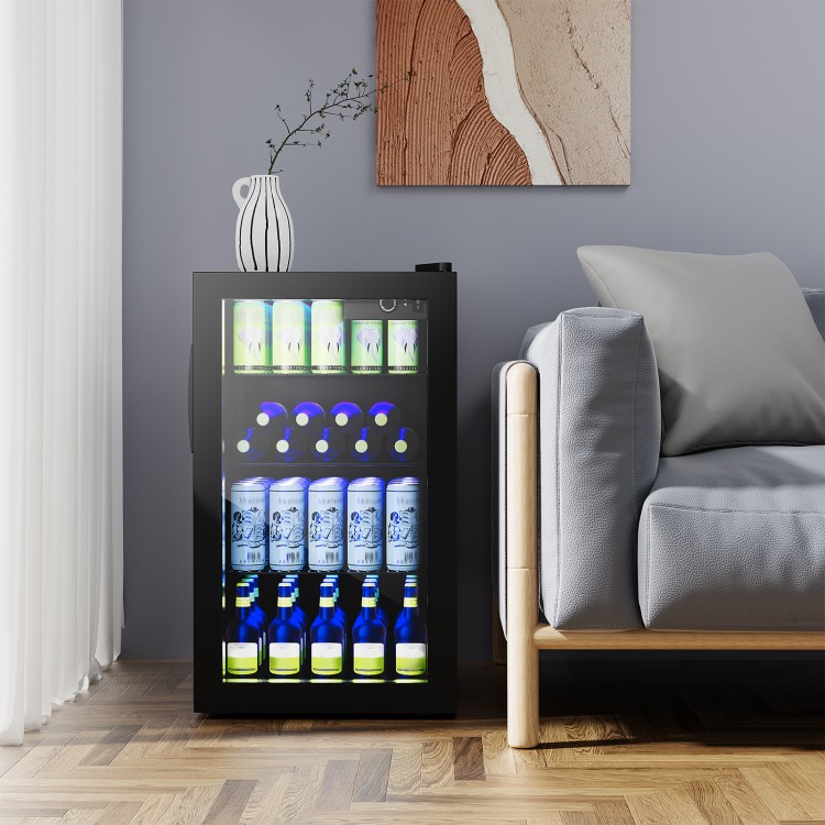 Beverage mini refrigerator with glass door, holding 120 cans, featuring LED light and chrome shelves for easy access.