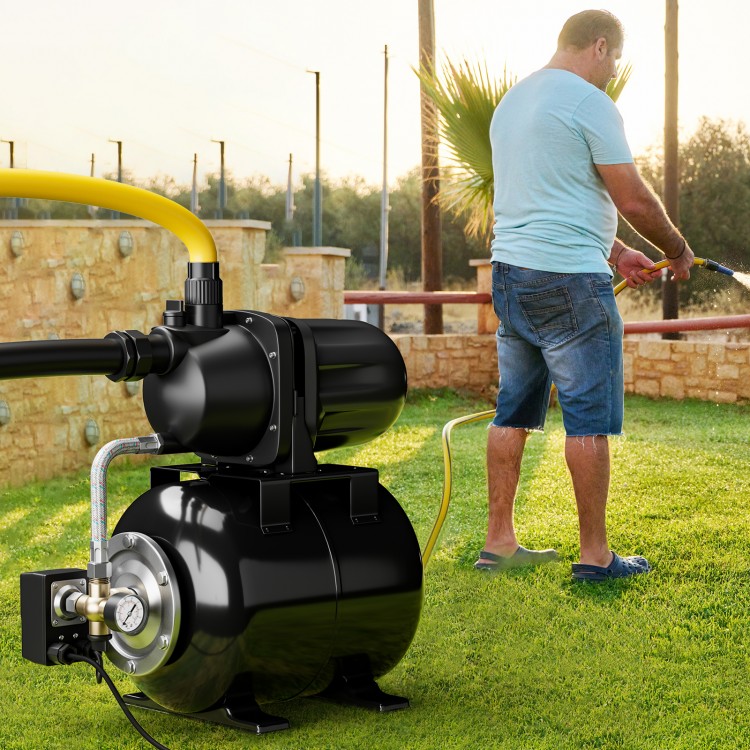 Black 1200 W garden water pump with yellow hose, ideal for pressurized irrigation and transferring water efficiently.