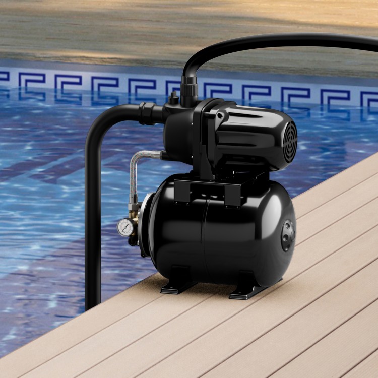 Black 1200 W garden water pump on a deck by a pool, ideal for pressurized irrigation and water transfer.