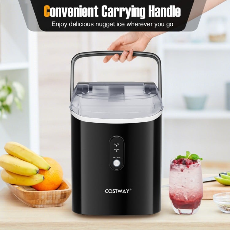 Nugget countertop ice maker in black with a carrying handle, producing soft chewable ice for beverages.