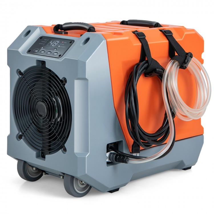 Commercial dehumidifier with pump and drain hose, featuring a digital display and portable design for easy transport.