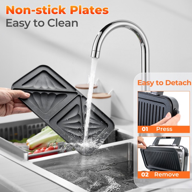Removable non-stick plates of the 3-in-1 sandwich maker being rinsed, showcasing easy cleaning and convenience.