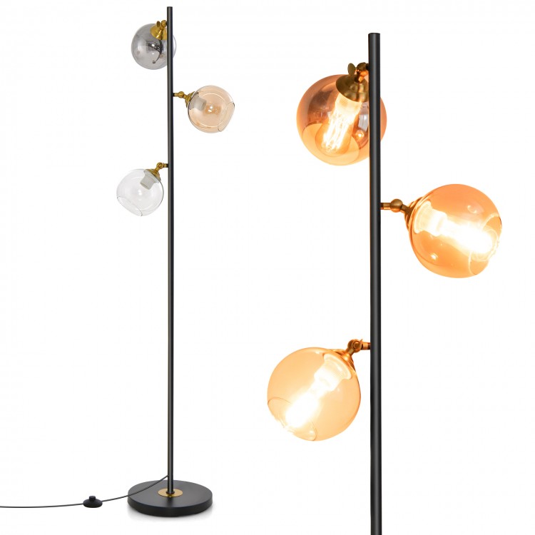 Mid Century floor lamp featuring three glass globe lampshades in different colors, with a sturdy weighted base for.