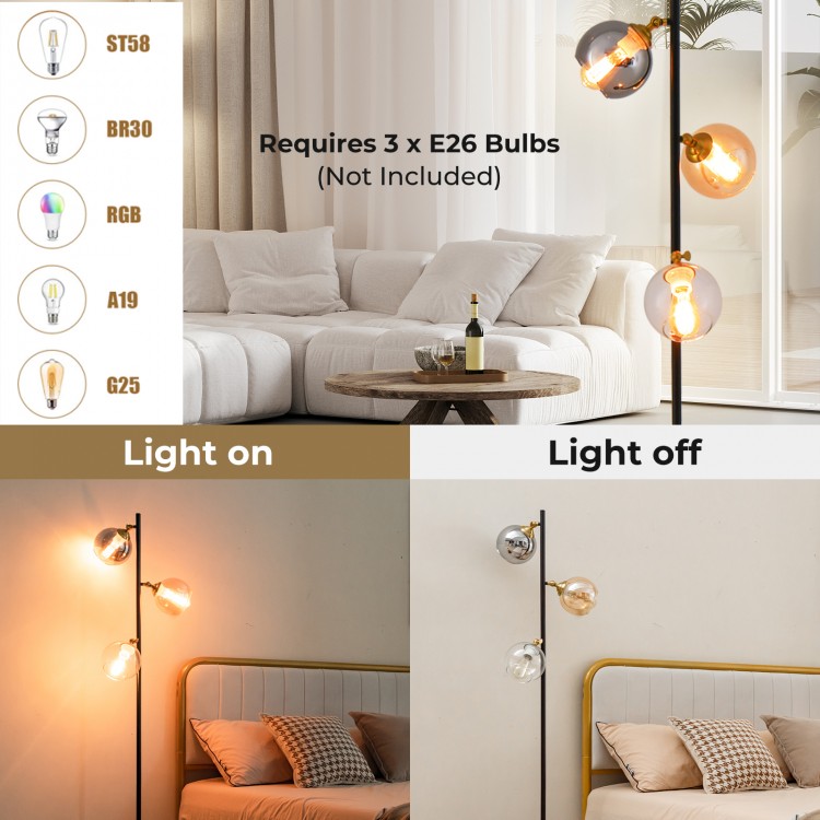 Mid Century floor lamp featuring 3 glass globe lampshades and a weighted base, ideal for stylish living room lighting.