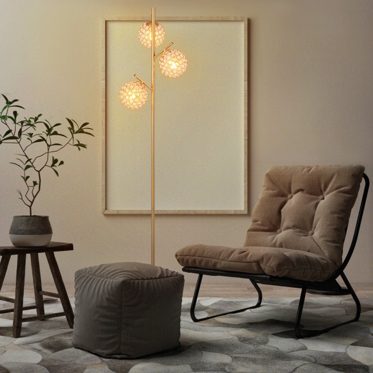 3-globe floor lamp with golden finish, featuring acrylic shades and foot switch, ideal for home or cafe lighting.