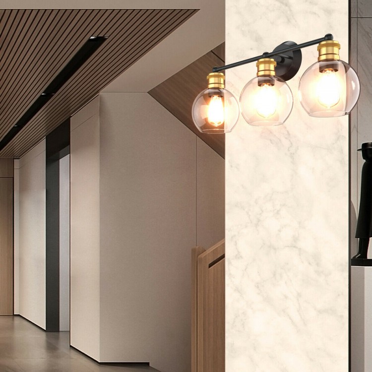 Modern 3-light bubbled glass vanity light with black iron frame and golden sockets, ideal for bathroom or hallway decor.
