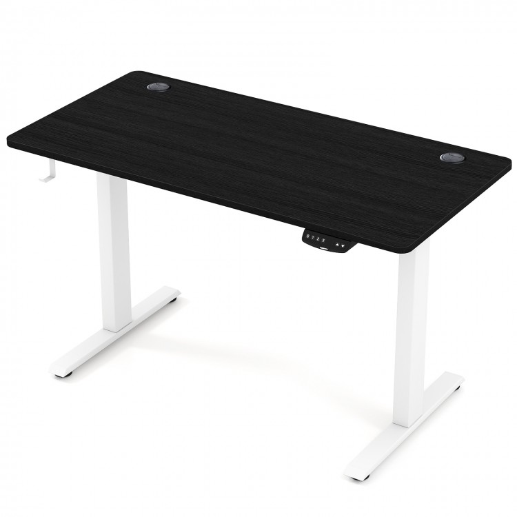 Electric standing desk in black with height adjustment, memory settings, and cable management for organized workspace.