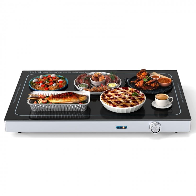 Electric warming tray with adjustable temperature, featuring a tempered glass top and various dishes for buffet use.