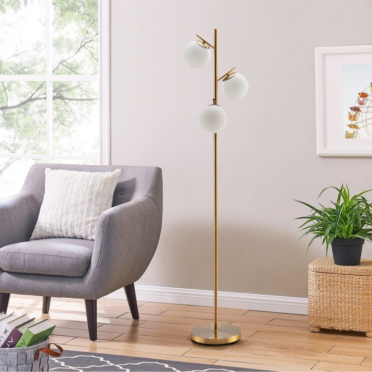 Three-globe floor lamp in golden finish with glass shades, featuring a foot switch for convenience, ideal for home.
