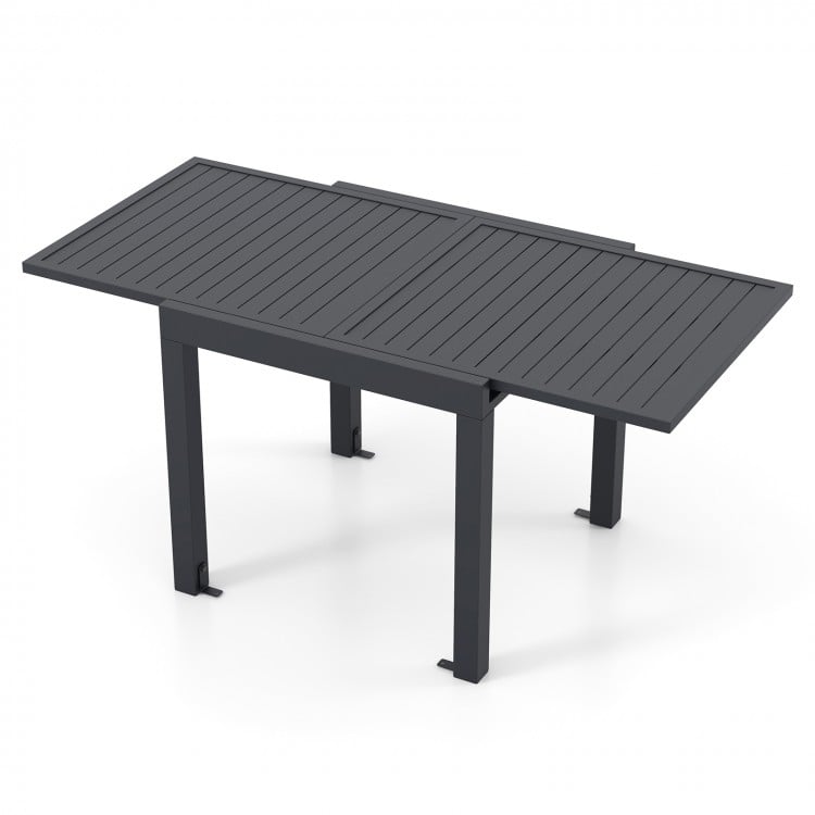 Top view of the expandable grey patio dining table with slatted design, sturdy aluminum legs for versatile.