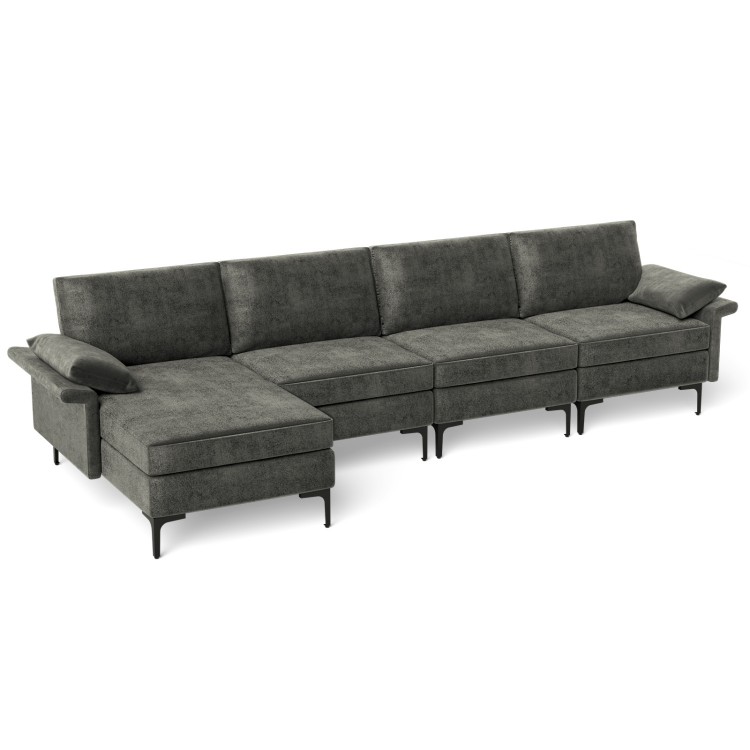 Side view of the gray extra large L-shaped sectional sofa featuring plump upholstery and a reversible chaise for.