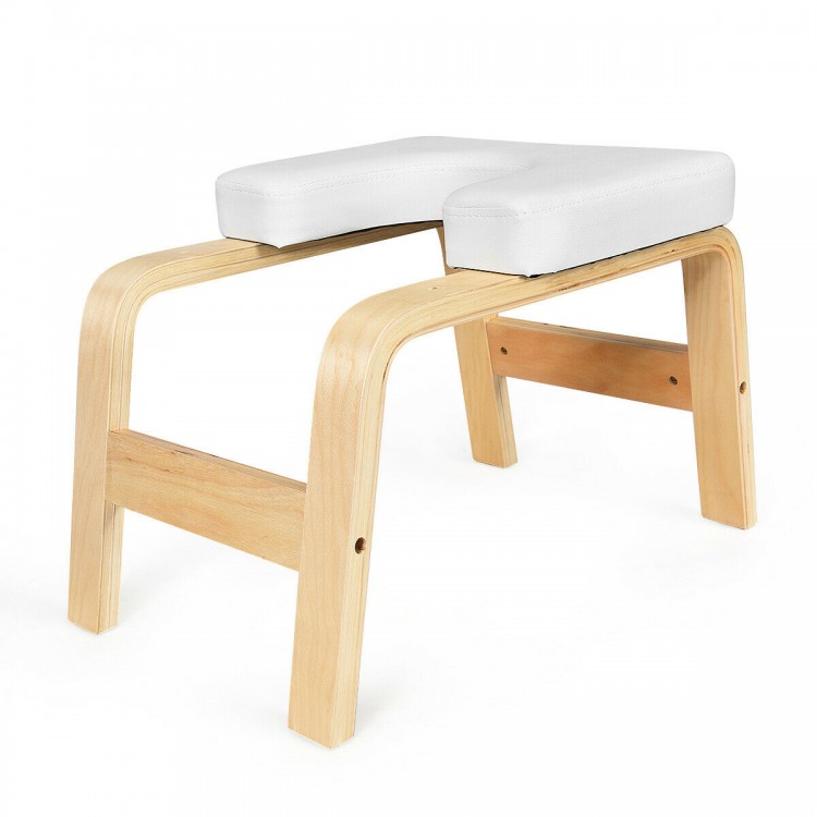Wooden yoga headstand stool with white PVC pads, featuring a sturdy design for stability and comfort during exercises.
