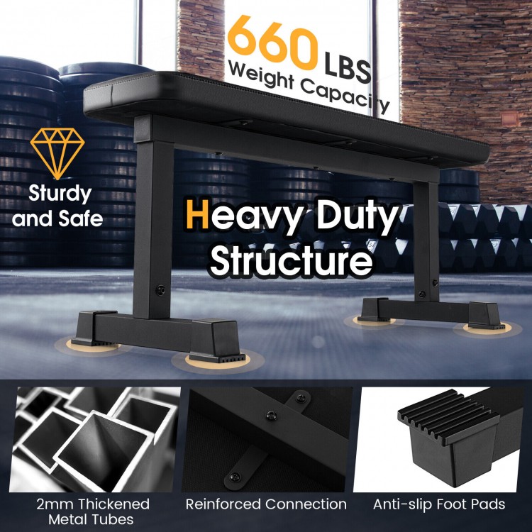 Flat weight bench in black with 660 lbs capacity, featuring thick cushion and anti-slip foot pads for stability.