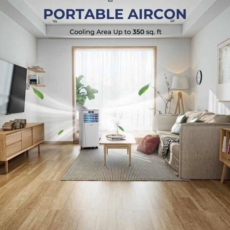 Portable air conditioner in a living room, 10000 BTU, features cooling, dehumidifying, and fan modes for versatile.