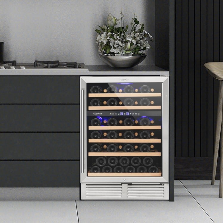 Dual zone wine cooler for 51 bottles with a reversible door, featuring beech wood shelves and blue LED lights for.