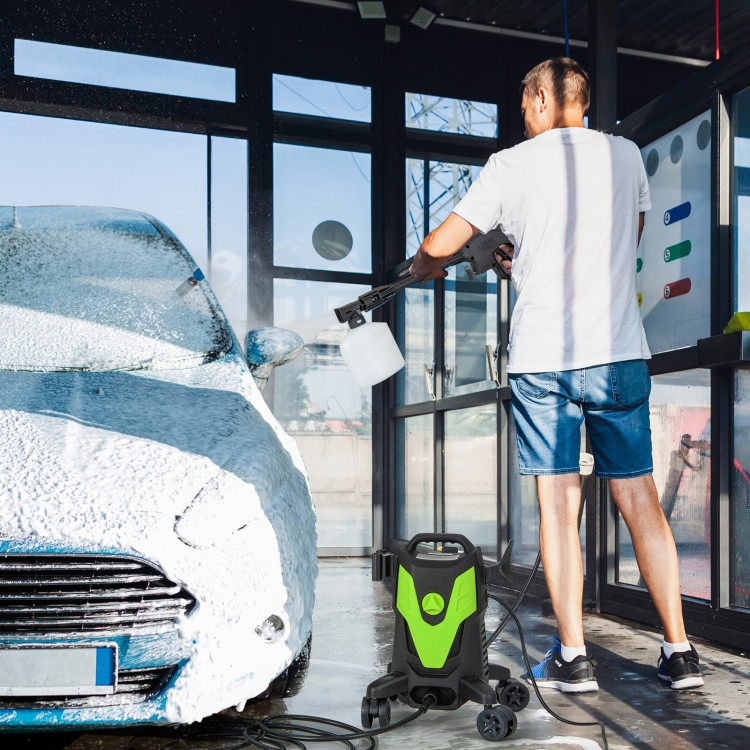 Electric pressure washer with 4 wheels in use, cleaning a car with foam, showcasing its portability and versatility.