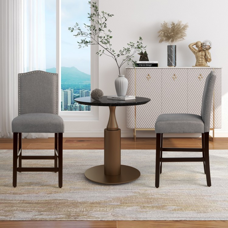 Gray fabric counter height dining side chairs set with rubberwood legs and brass nail design for modern elegance.