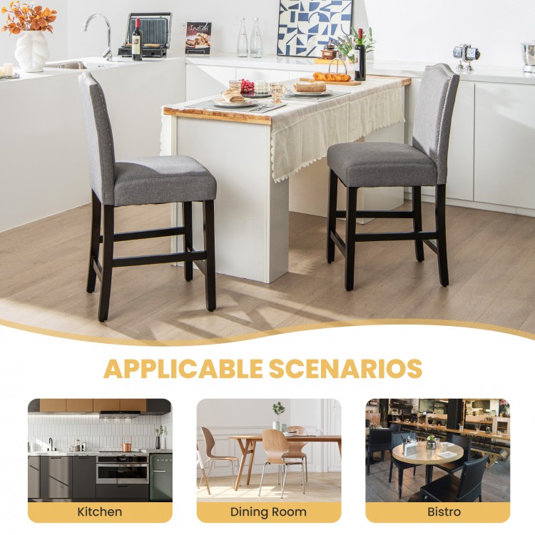 Gray fabric counter height dining side chairs with rubberwood legs, ideal for kitchens and dining rooms.