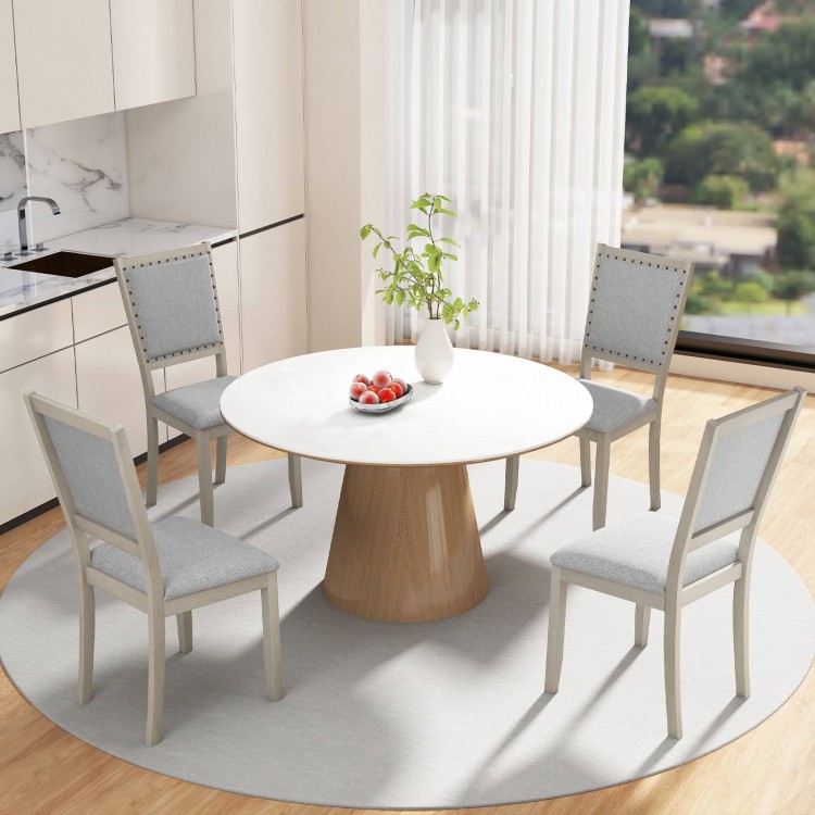 Grey fabric upholstered dining chairs with rubber wood frame, featuring vintage nailheads, perfect for rustic dining.
