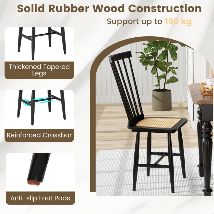 Black farmhouse dining chair with PE rattan seat, solid rubber wood construction, ergonomic backrest, ideal for dining.
