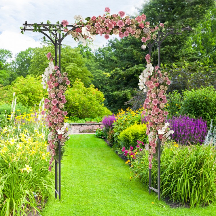 Garden arbor with trellises for climbing plants, featuring a decorative arch and vibrant floral arrangements, ideal for.