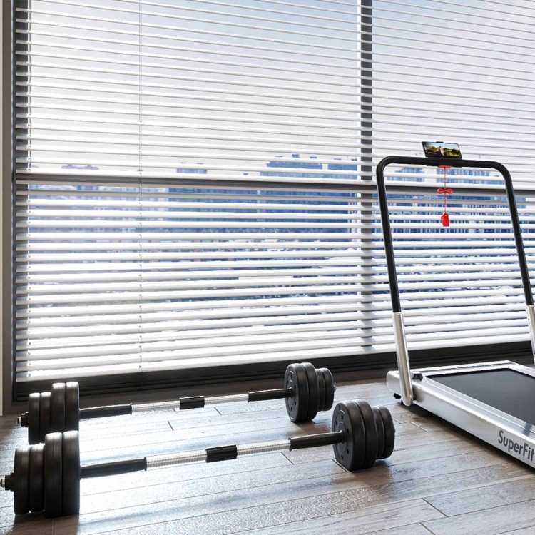 Dumbbell weight set with 3-in-1 folding treadmill in a fitness room, featuring a 3HP motor and LED display.