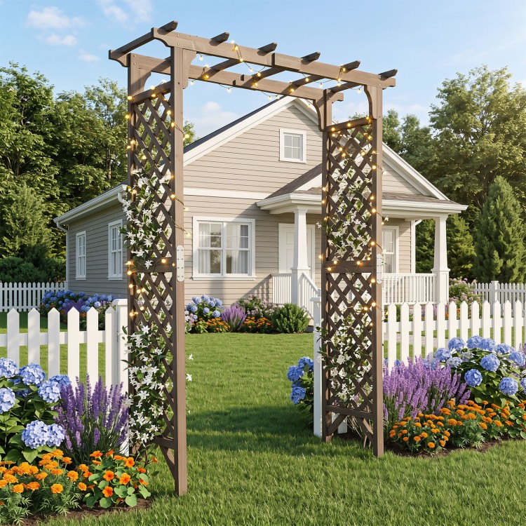 Flat top garden arch with lattice trellises, designed for climbing plants, featuring a decorative light string overhead.