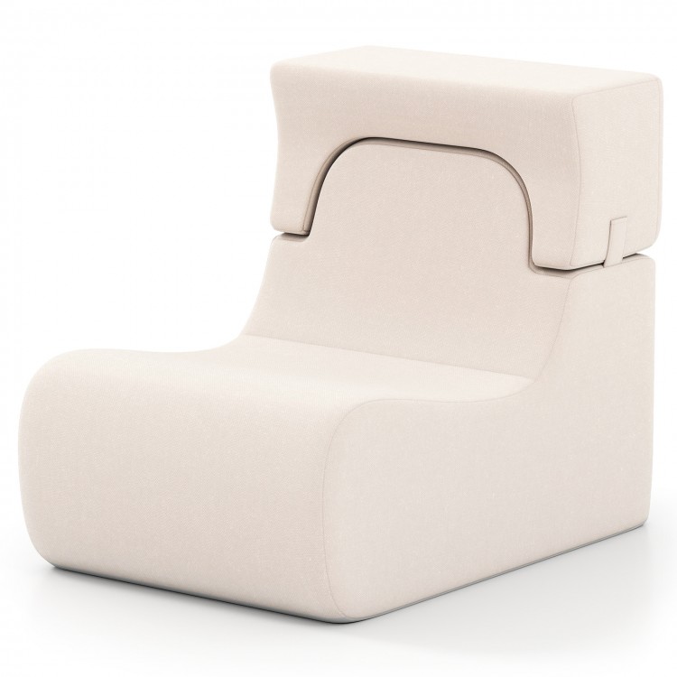 Curved beige floor chair with detachable headrest, made of ice velvet fabric, perfect for relaxing or reading.