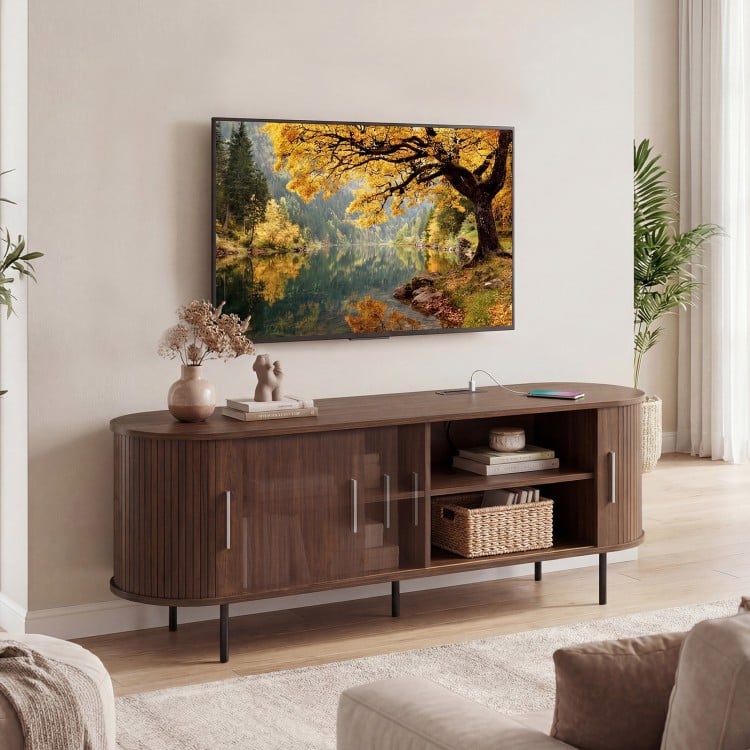 Curved walnut fluted TV stand with 8 compartments and 2 AC outlets, perfect for living room or bedroom storage.