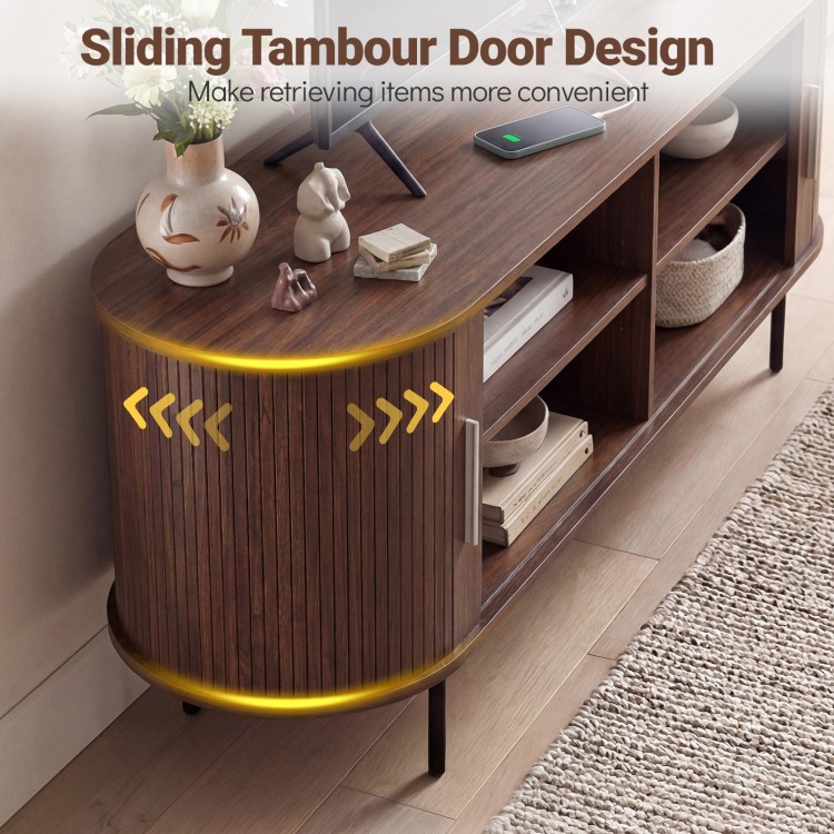 Fluted TV stand with sliding tambour door design, walnut finish, and spacious compartments for organized storage.