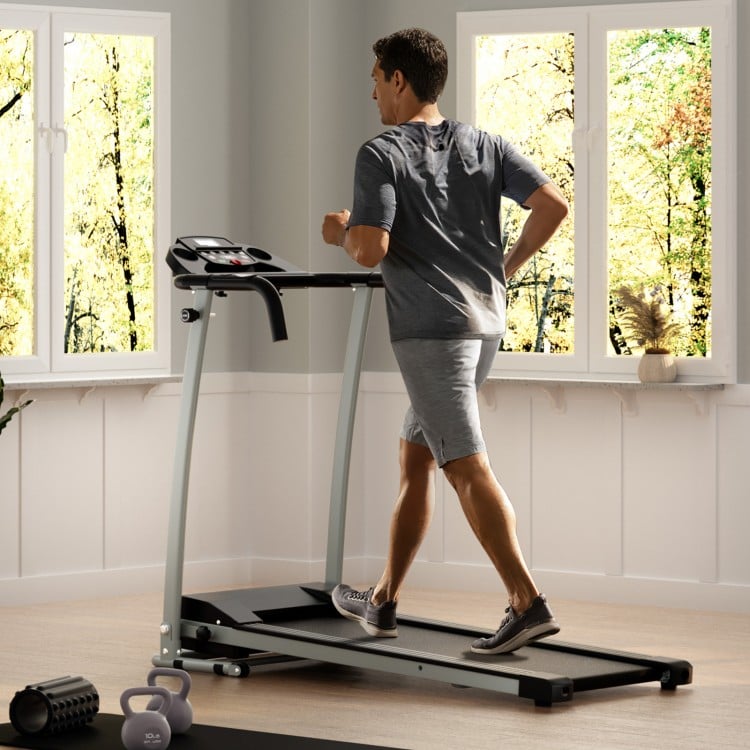 Folding treadmill with LCD display, 12 preset programs, and 7-layer non-slip running belt for home workouts.