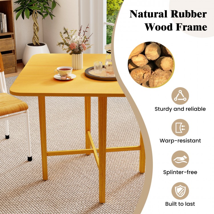 Foldable dining table for 2-4 people with natural rubber wood frame, featuring drop leaf panels and rustic wood grain.