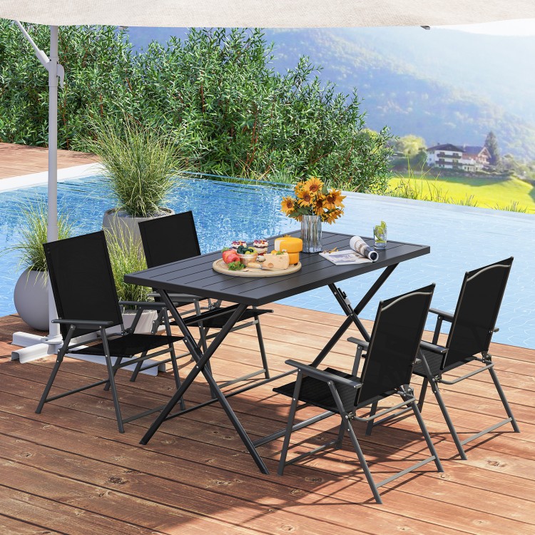 Foldable 48x30 inch black metal patio dining table with slatted tabletop, perfect for outdoor gatherings by the pool.