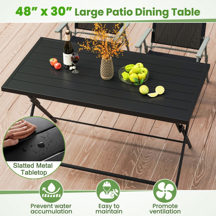 Large black foldable outdoor dining table with slatted metal tabletop, ideal for patio or garden gatherings.