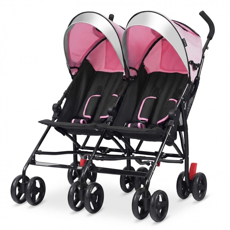 Foldable twin baby double stroller in pink with ventilated canopy, 360-degree swivel wheels, and 5-point safety harness.