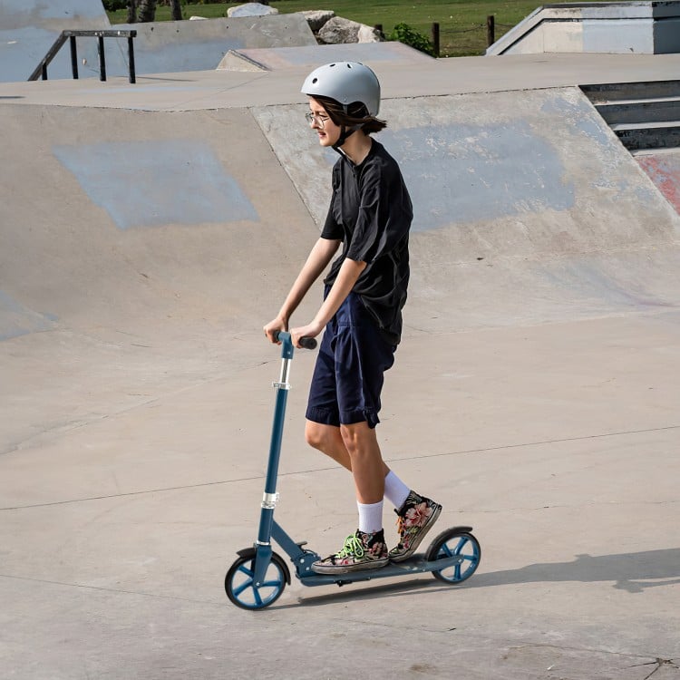 Blue folding aluminum alloy scooter with adjustable height, 8" PU tires, and anti-slip deck for kids and adults.