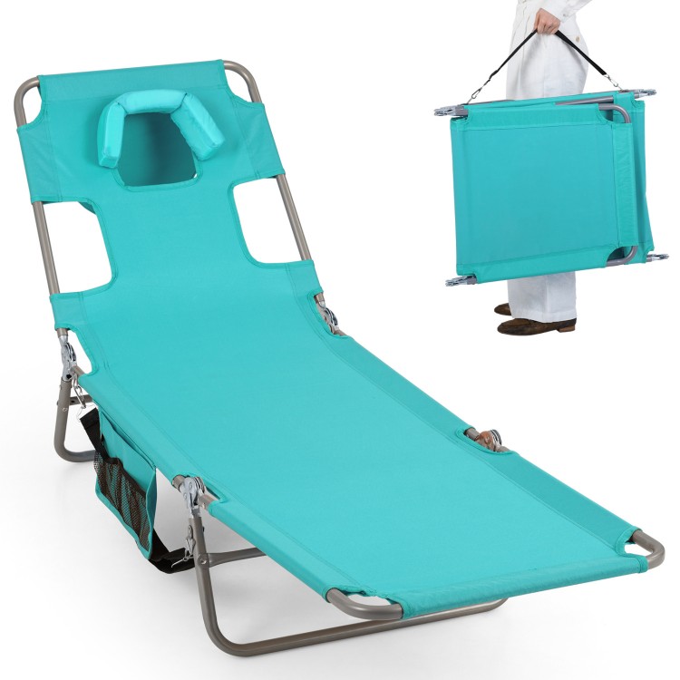 Light green folding beach lounge chair with adjustable backrest, face hole, and compact design for easy transport.