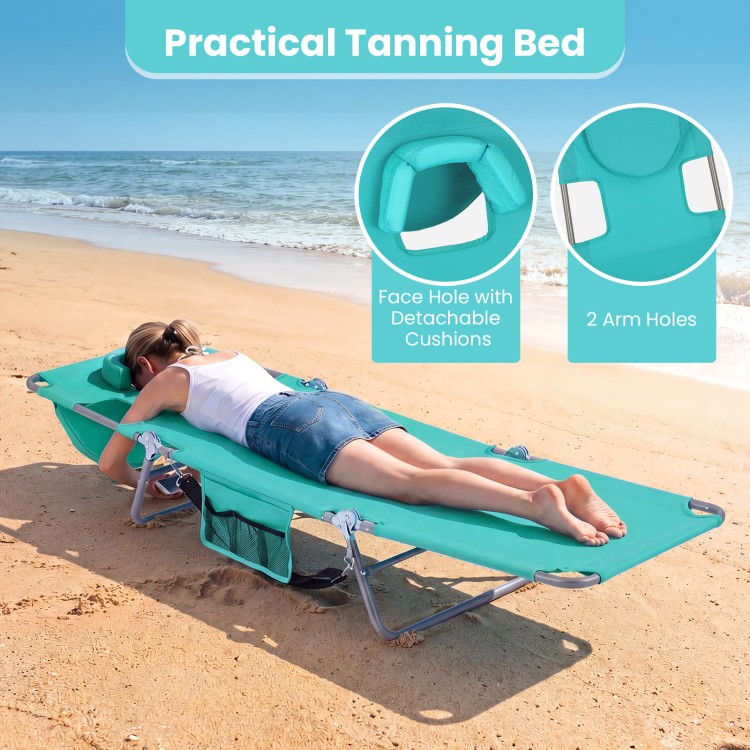 Folding beach lounge chair in light green with adjustable backrest, face hole, and arm holes for hands-free tanning.