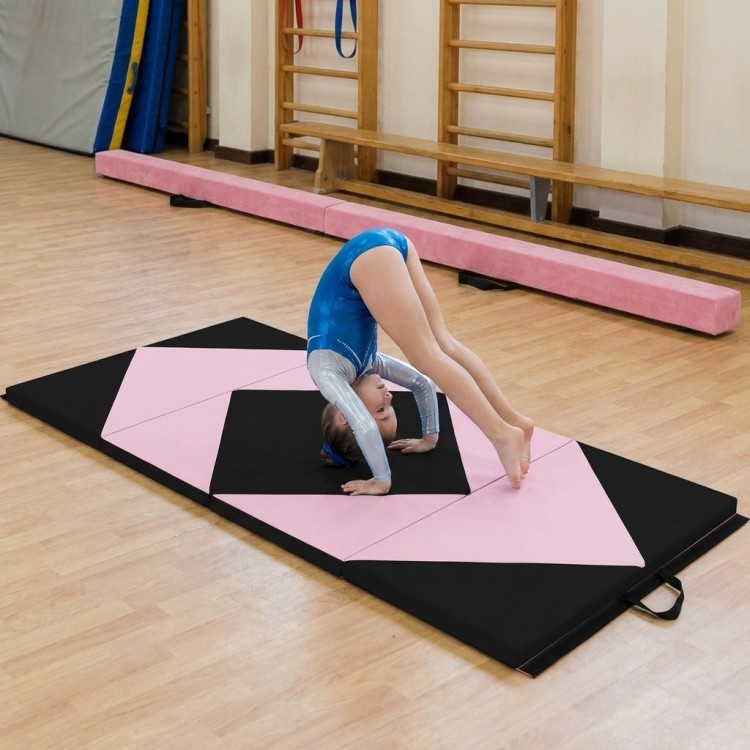 Folding gymnastics mat with pink and black design, featuring high-density foam for safety and interconnectable design.