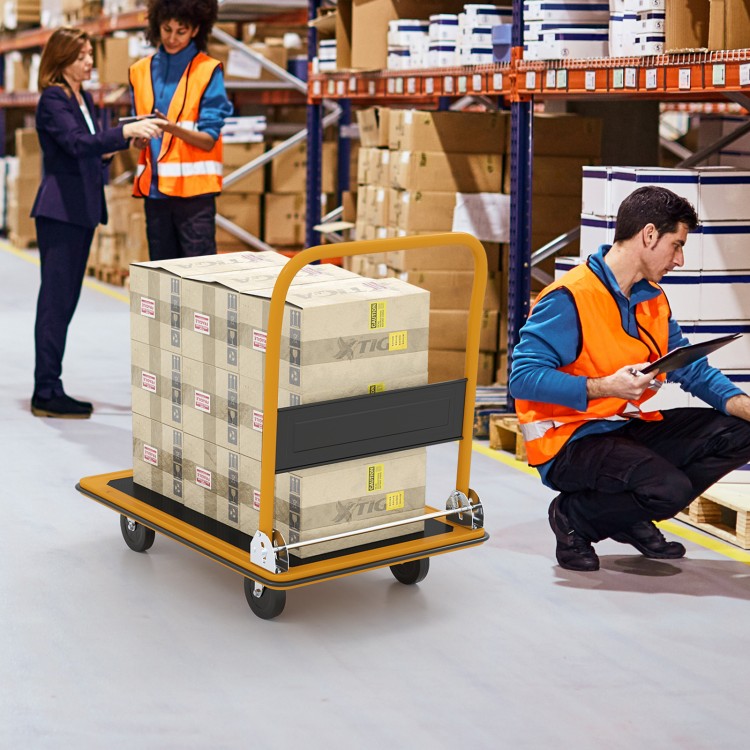 Folding platform cart dolly with black vinyl platform, 660lbs capacity, shown in a warehouse setting with boxes.