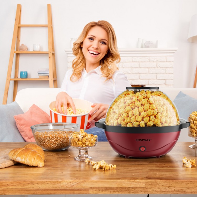 Stirring popcorn popper in red with 6-quart capacity, shown with popcorn and a smiling user for family movie nights.