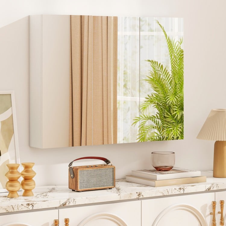 Frameless bathroom wall-mounted mirror cabinet with three mirrored doors and soft close hinges for ample storage.